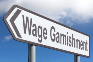 wage garnishment, irs, taxes, strategic tax resolution